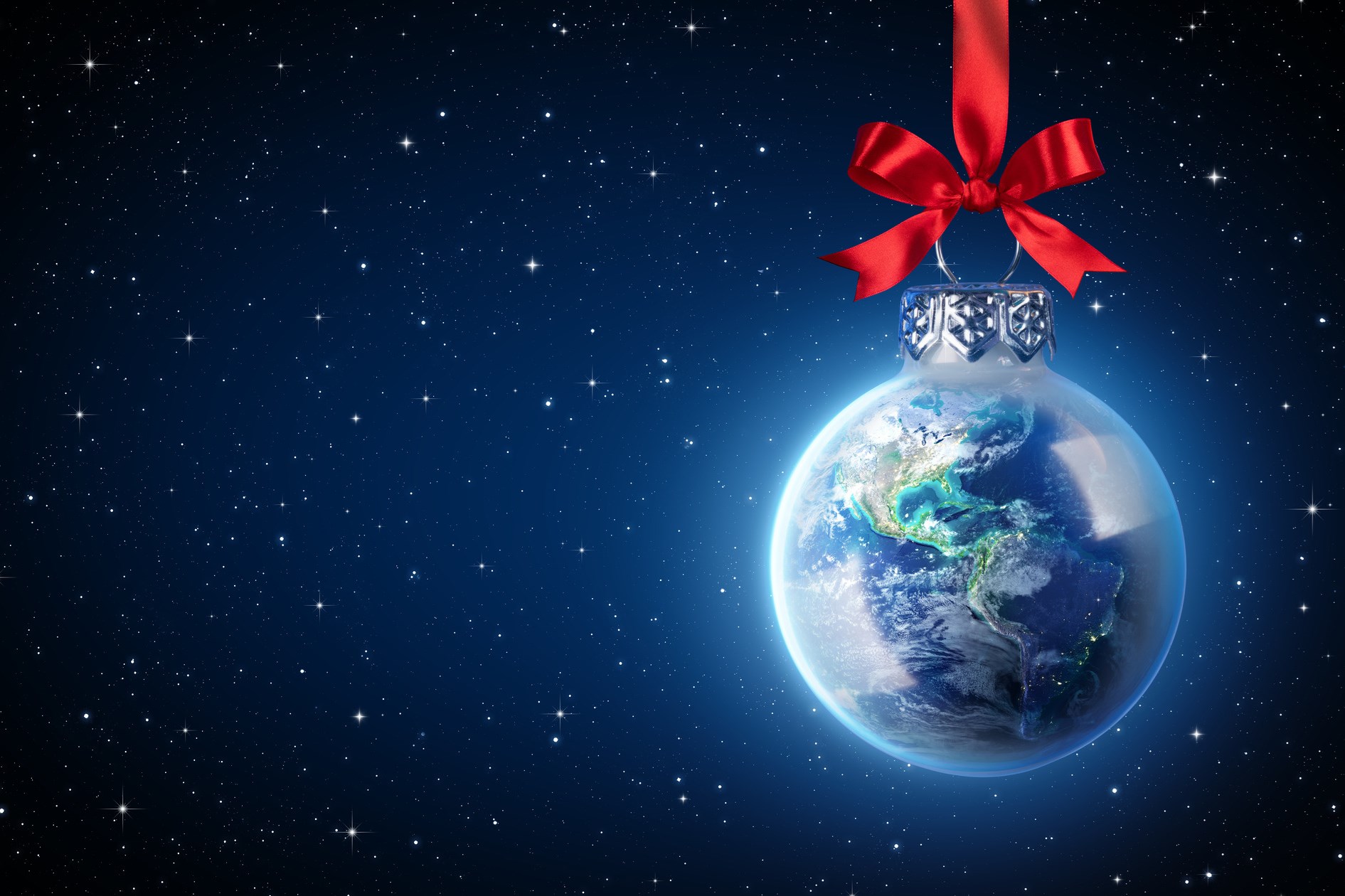 地球就像一个带着红色蝴蝶结的圣诞球